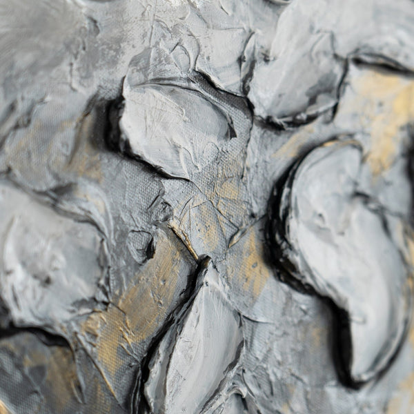 The painting "Couple in the Depths" is a relief animal abstraction in silver and gold tones.