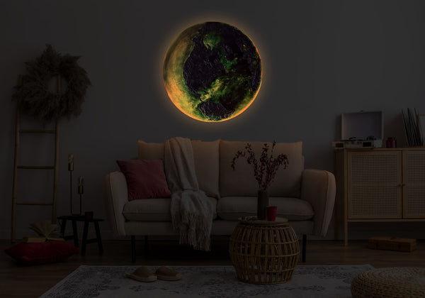 The painting "Pulse of the Planet" is a round art canvas with a textured relief and a fiery glow