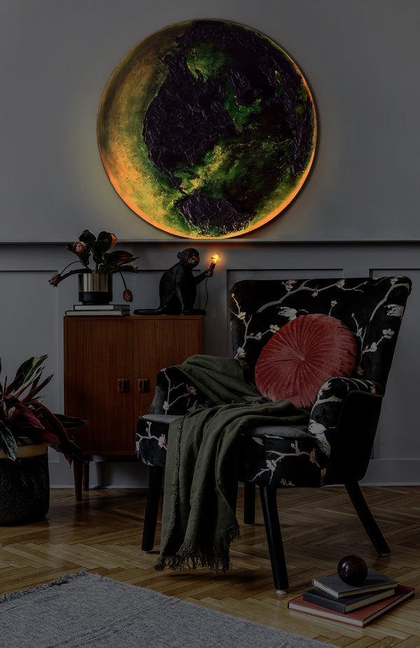 The painting "Pulse of the Planet" is a round art canvas with a textured relief and a fiery glow