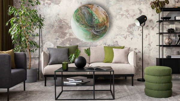 The painting "Green Orbit" is a round textured canvas with a natural character and a glowing effect