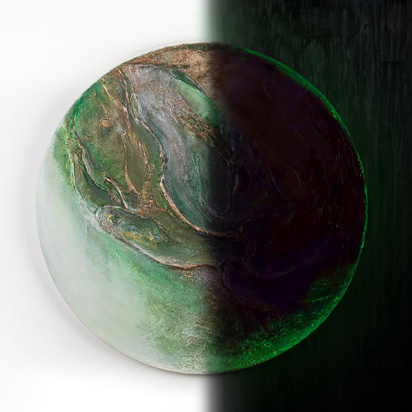 The painting "Green Orbit" is a round textured canvas with a natural character and a glowing effect