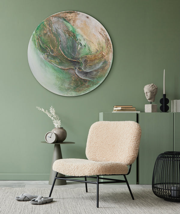 The painting "Green Orbit" is a round textured canvas with a natural character and a glowing effect