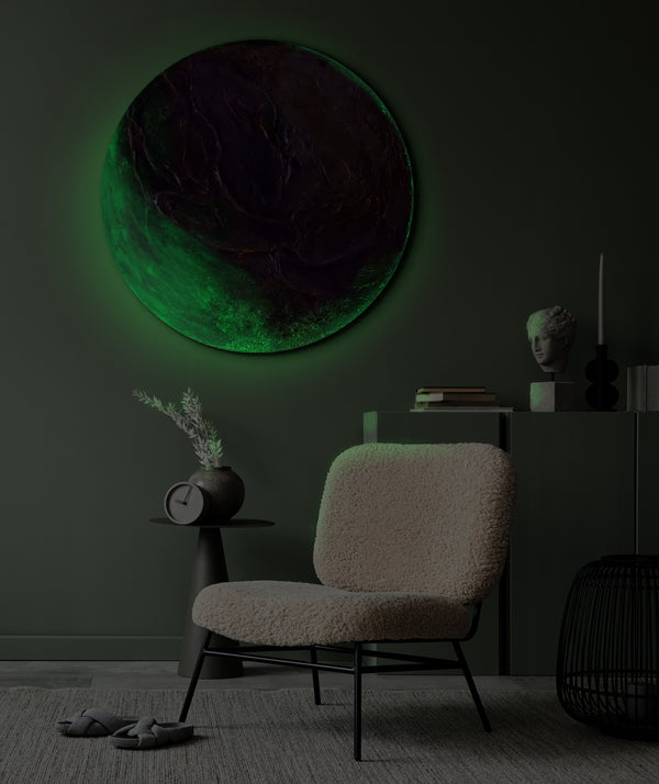 The painting "Green Orbit" is a round textured canvas with a natural character and a glowing effect