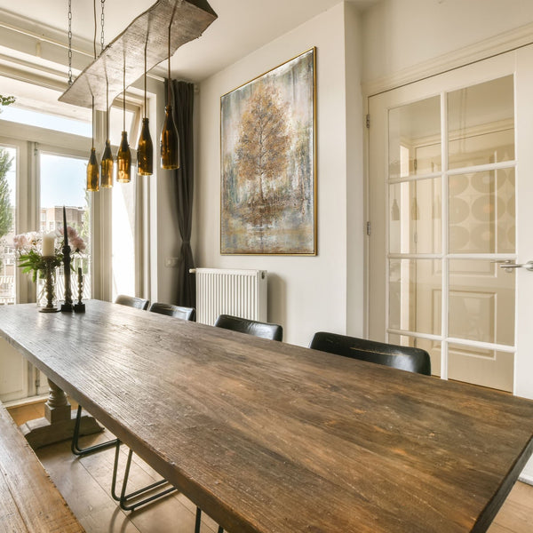 The painting "Melody of Solitude" is a vertical textural work with golden wood