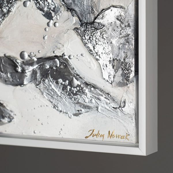 The painting "Minerals of Light" is an abstraction with gold and silver textures.
