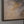 The painting “Darkness and Dawn” is a textured abstraction with a texture in natural tones.