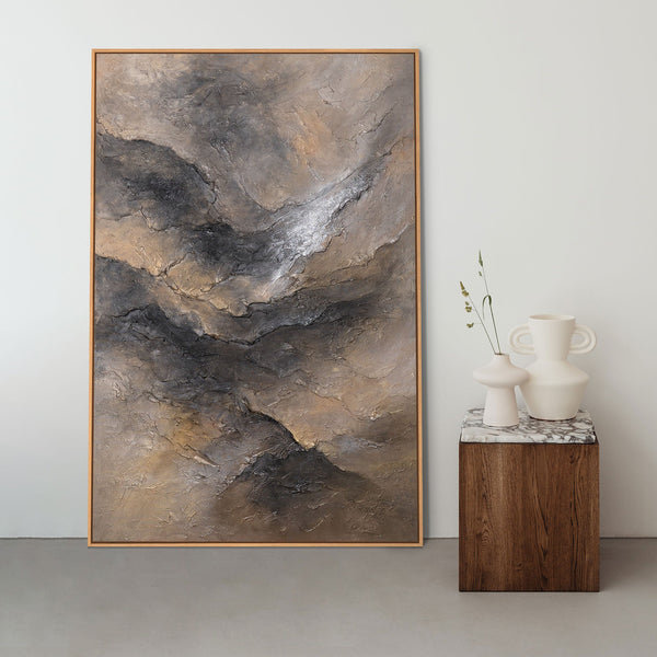 The painting “Darkness and Dawn” is a textured abstraction with a texture in natural tones.