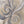 The painting “Sands and Clouds” — light abstract swirls on canvas