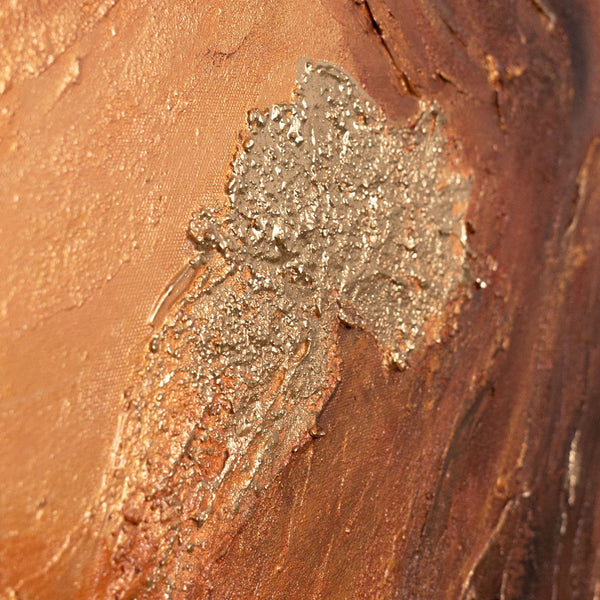 The painting “Amber Flows” is an abstract work in golden brown tones