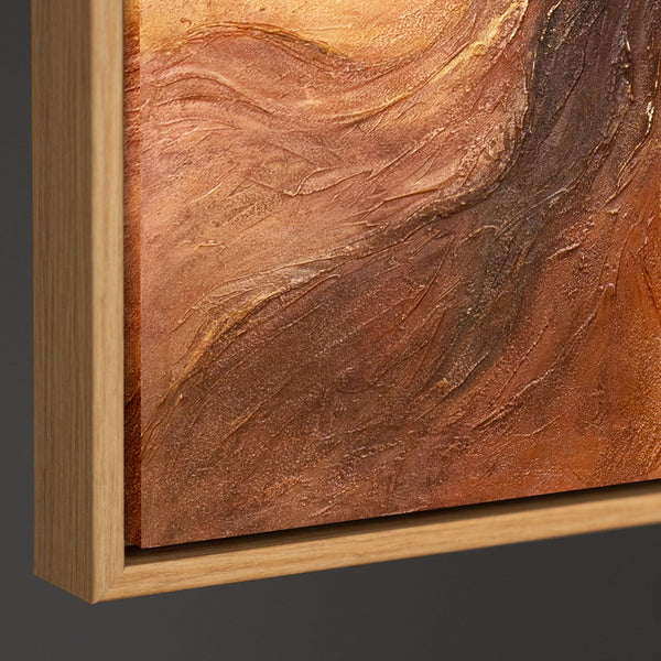 The painting “Amber Flows” is an abstract work in golden brown tones