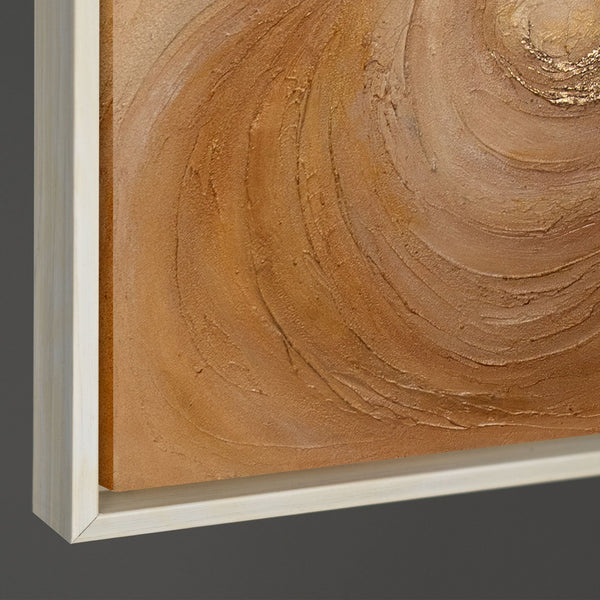 The painting “Warmth Whirlwind” is a textured abstraction in golden-copper tones.
