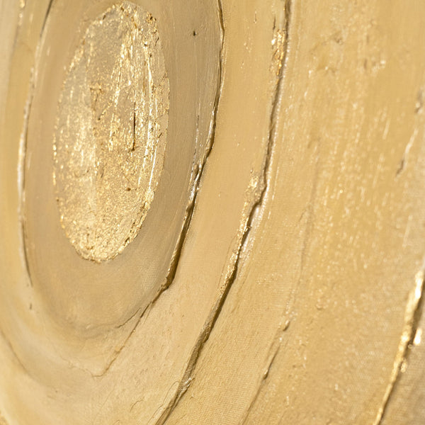 The painting “Circles of Time” is an abstract work with a voluminous texture in warm shades of gold
