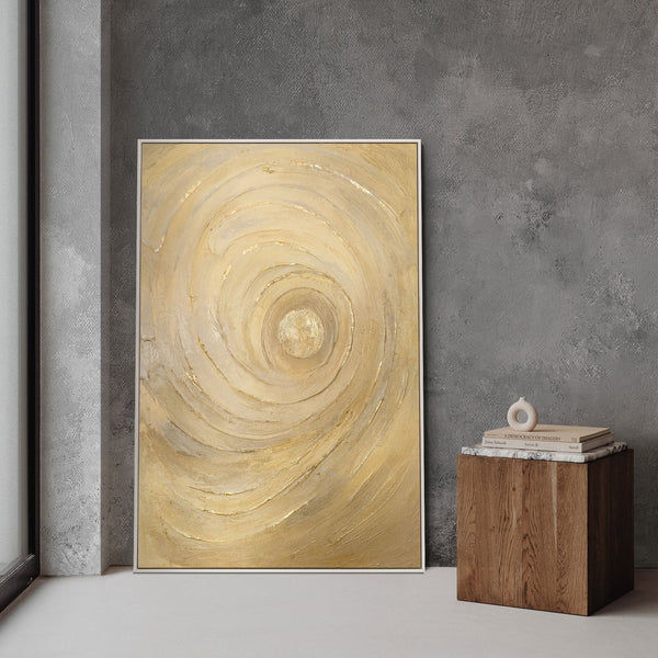 The painting “Circles of Time” is an abstract work with a voluminous texture in warm shades of gold