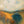 The painting “Golden Space” is an abstract landscape in warm tones