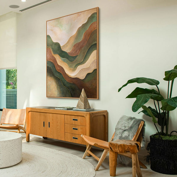 The painting “Dance of the Hills” is an abstract landscape in green tones