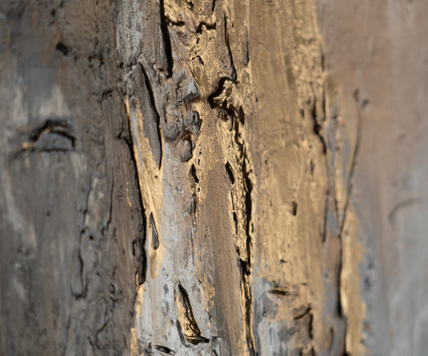The painting "Mineral Radiance" is an abstraction in a restrained range with a golden accent.