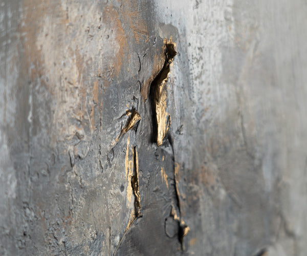 The painting "Mineral Radiance" is an abstraction in a restrained range with a golden accent.