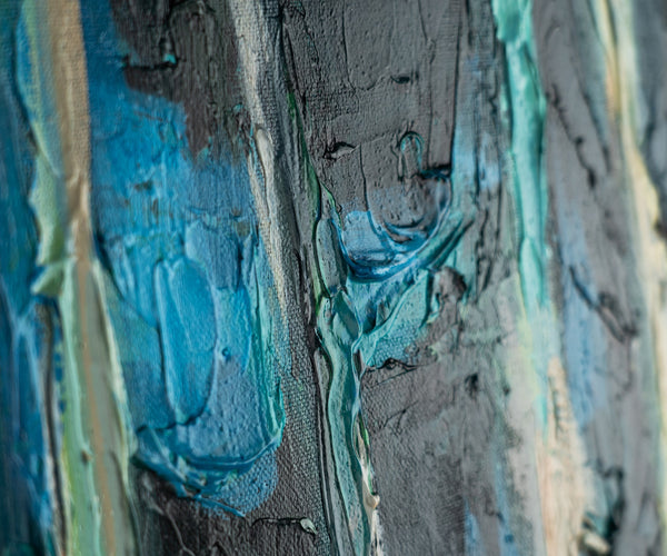 The painting "The Silence of the Birch Glade" is an abstract impression of nature in green and blue tones.