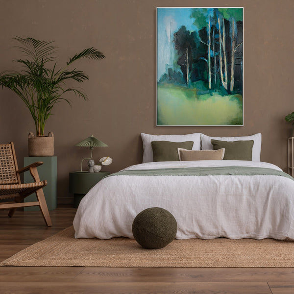 The painting "The Silence of the Birch Glade" is an abstract impression of nature in green and blue tones.