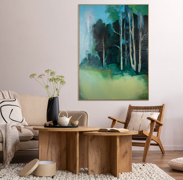 The painting "The Silence of the Birch Glade" is an abstract impression of nature in green and blue tones.