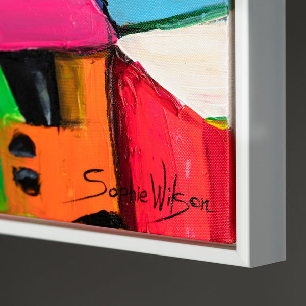 The painting "City of Colors" is a bright urban abstraction