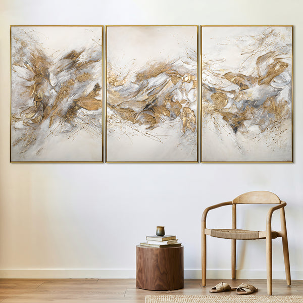 The painting "Shining Shades" is an abstract triptych in a light palette with gold accents