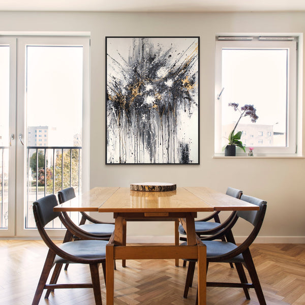 The painting "Dance of Splashes" is an abstraction in a black, white, and gold palette.