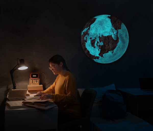 The painting "Shadow of the Continents" is a round abstraction that glows in the dark