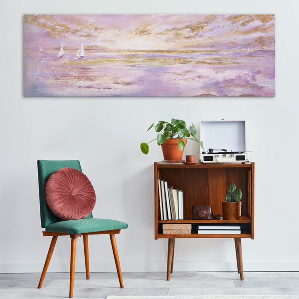 The painting "Rays of the Sun" is a calm seascape in gentle tones.