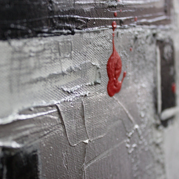 The painting "Courage" is a geometric abstraction with red accents
