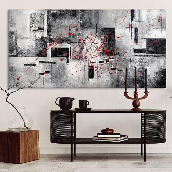 The painting "Courage" is a geometric abstraction with red accents
