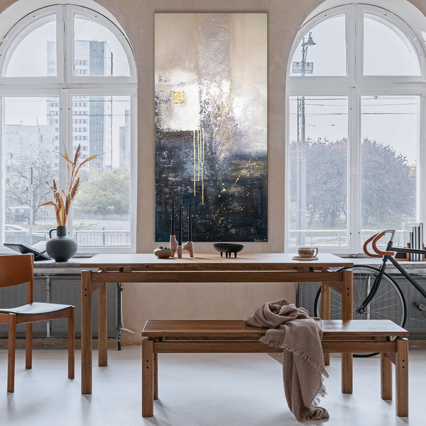 The painting "Fragment" is a play of textures and metallic accents