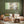 The painting “Quiet Harbor” is an abstract softness of green and gold