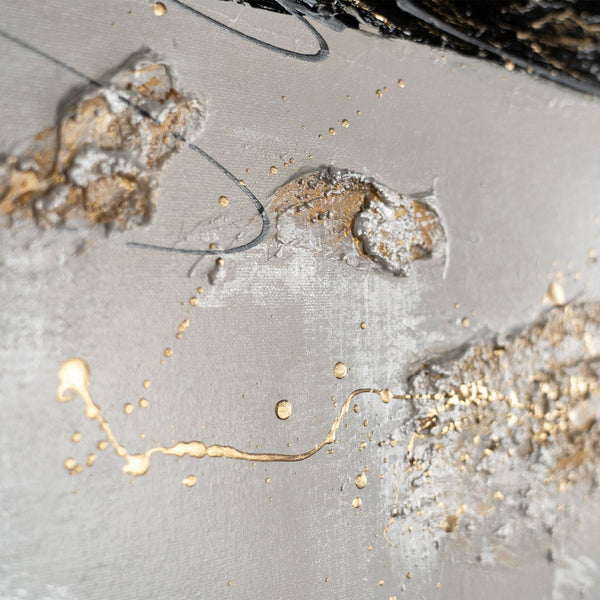 The painting "Lines in the Sand" is a dynamic abstraction in a gold-graphite palette