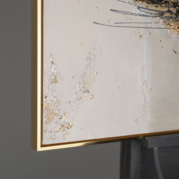 The painting "Lines in the Sand" is a dynamic abstraction in a gold-graphite palette
