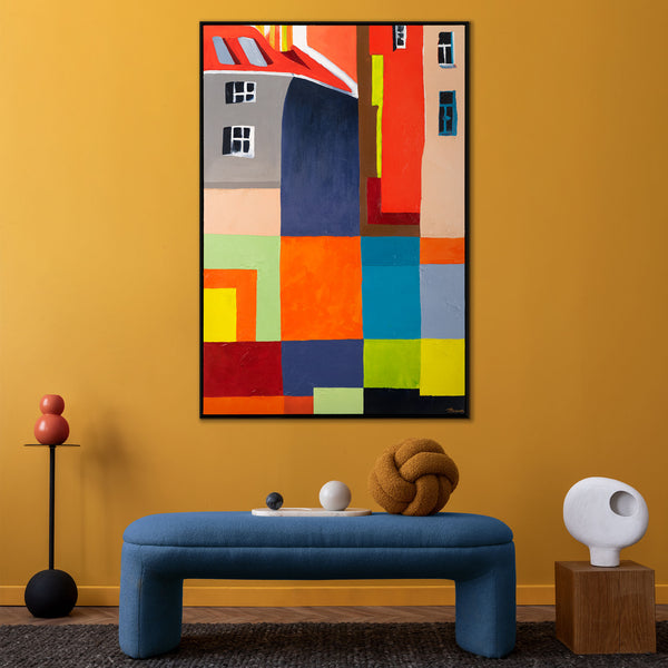 The painting "City in Color" is a bright geometric abstraction with architectural motifs