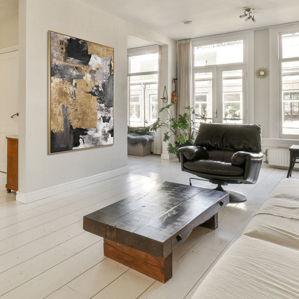 The painting "Presence of Form" is a vertical abstraction with warm golden-graphite accents
