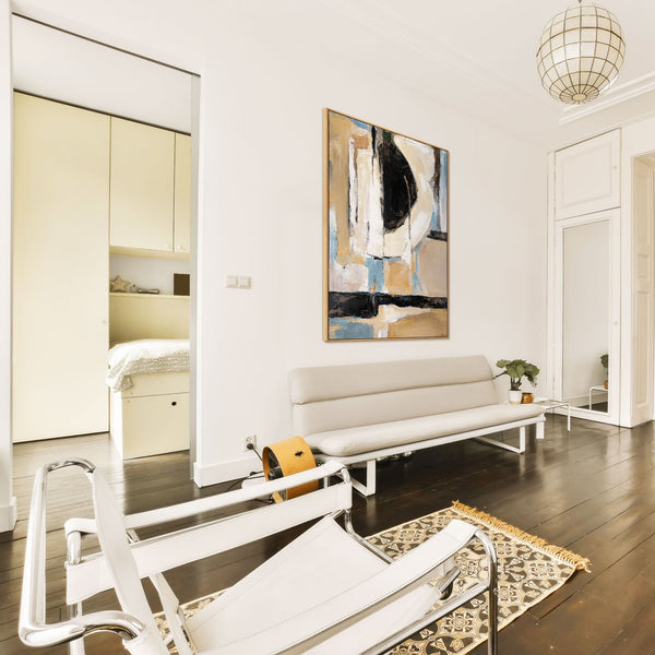 The painting "Silence of Space" is a vertical abstraction in a neutral palette