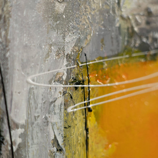 The painting "Urban Glow" is a vertical abstraction with the energy of the sun