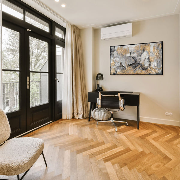 The painting "Pulse of the Earth" is a horizontal abstraction with graphite and gold shades