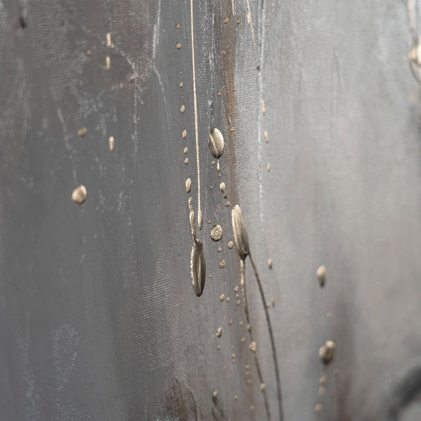 The painting "Breath of Stone" is a vertical abstraction in gray-gold tones.