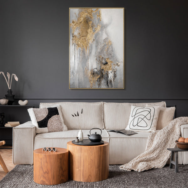 The painting "Breath of Stone" is a vertical abstraction in gray-gold tones.
