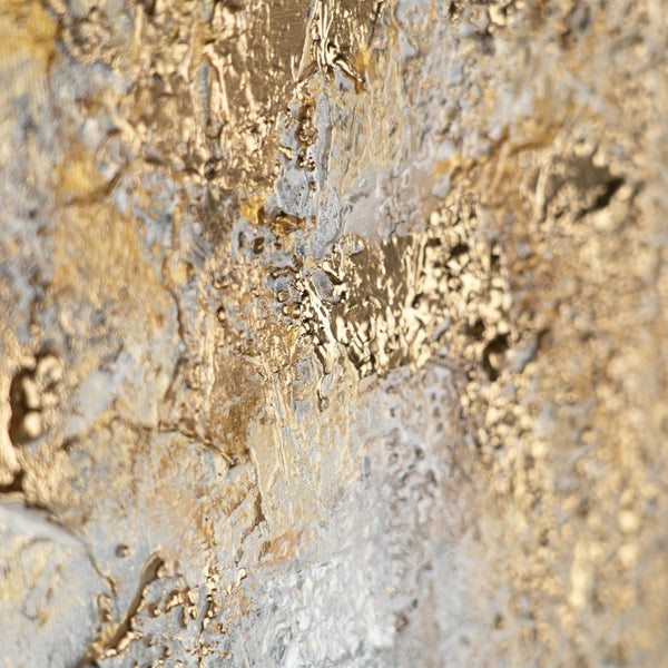 The painting "Golden Silence" is a horizontal abstraction with a metallic sheen