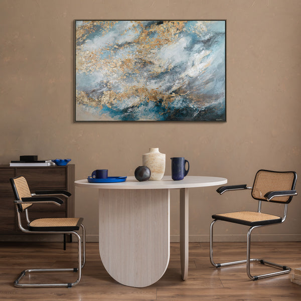 The painting "Gold of the Clouds" is an abstraction with the lightness of the sky and the shine of metal.