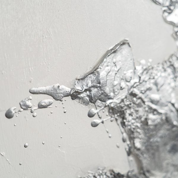 The painting "Minerals of Light" is an abstraction with gold and silver textures.