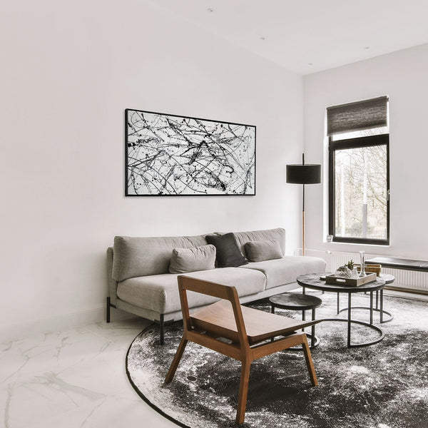 The painting "Chaos Control" is a monochrome abstraction in the style of action painting